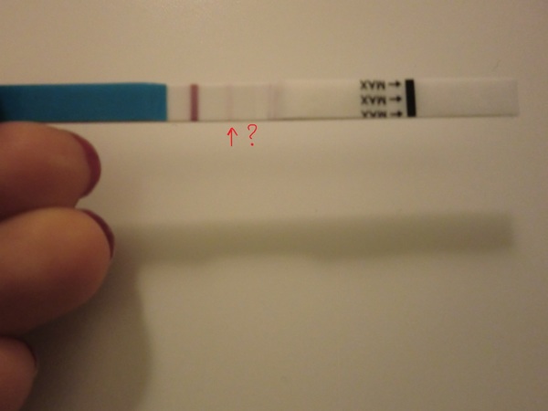 Как выглядит слабоположительный тест на беременность фото